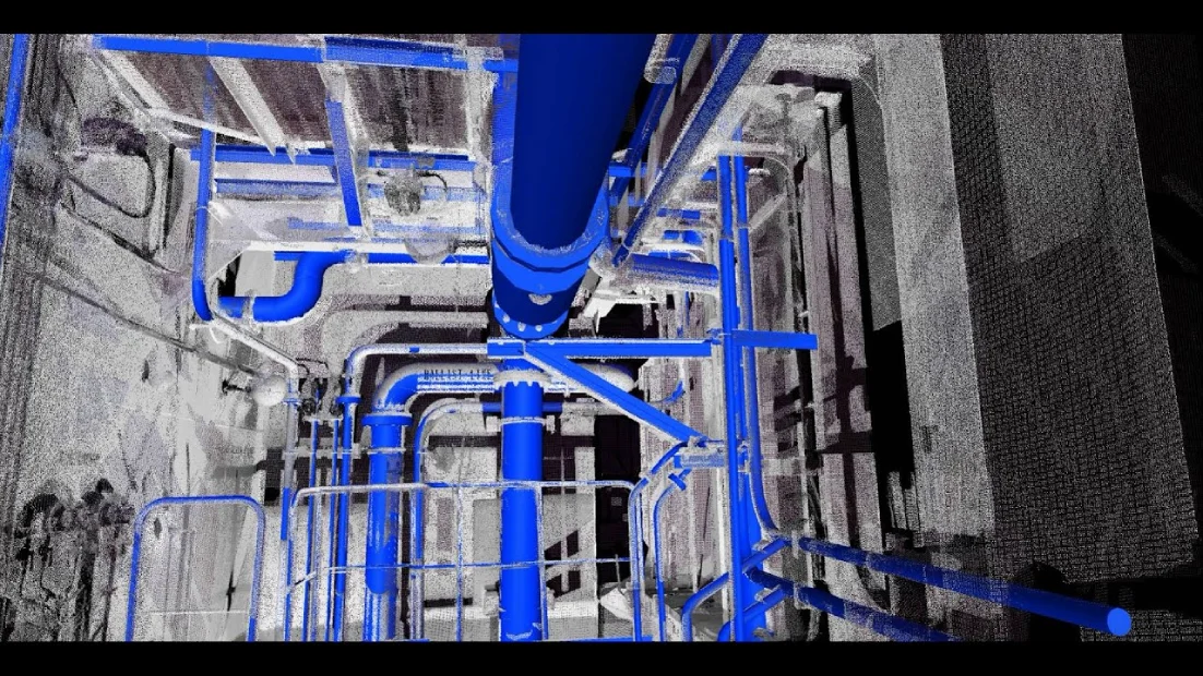 A 3D scan or visualization of a mechanical space with a complex network of blue pipes, highlighting the detailed infrastructure often used for planning or diagnostics in engineering contexts